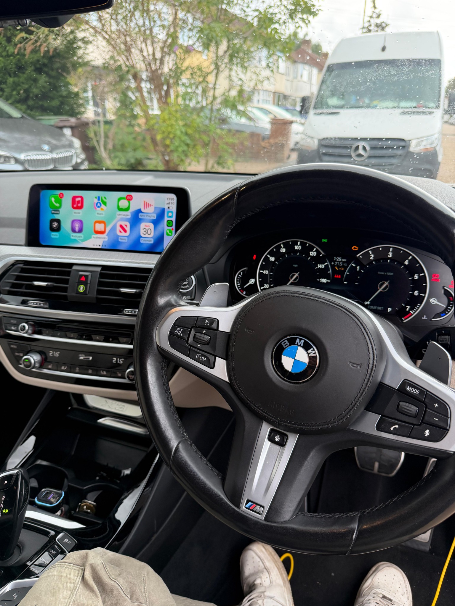 Apple CarPlay running on a BMW iDrive screen